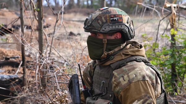 Un paramilitaire du groupe de sécurité privée Wagner dans le Donbass - Sputnik Afrique