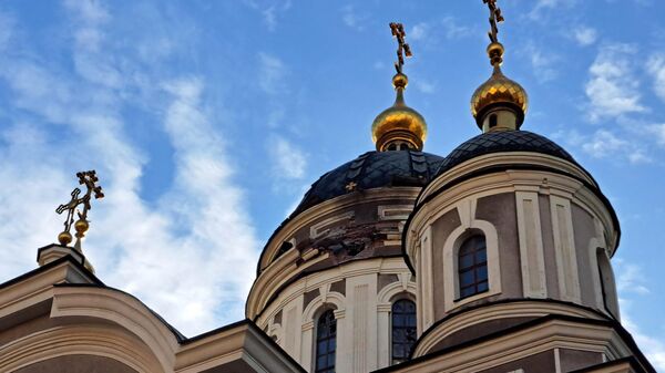 Une église à Donetsk endomagée par ub obus ukrainien - Sputnik Afrique