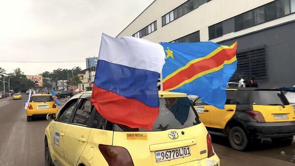 Un défilé automobile à Kinshasa, le 22 février 2023, en soutien à la Russie - Sputnik Afrique