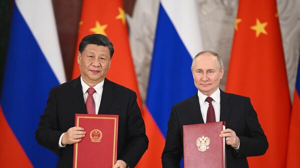 La signature des accords russo-chinois par Vladimir Poutine et Xi Jinping au Kremlin, le 21 mars 2023 - Sputnik Afrique