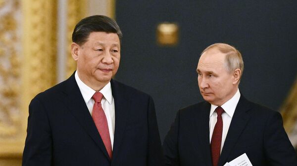 Xi Jinping et Vladimir Poutine, le 21 mars 2023 - Sputnik Afrique