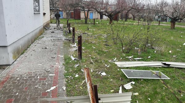 Un immeuble endommagé par des tirs ukrainiens à Melitopol - Sputnik Afrique