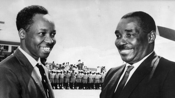 President Abeid Amani Karume of Zanzibar, right, is welcomed by President Julius Nyerere of Tanganyika on his arrival at Dar-Es-Salaam airport, Tanzania on April 27, 1964. - Sputnik Africa