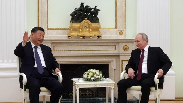 Chinese President Xi Jinping and Russian President Vladimir Putin attend a meeting at the Kremlin in Moscow, Russia. - Sputnik Africa