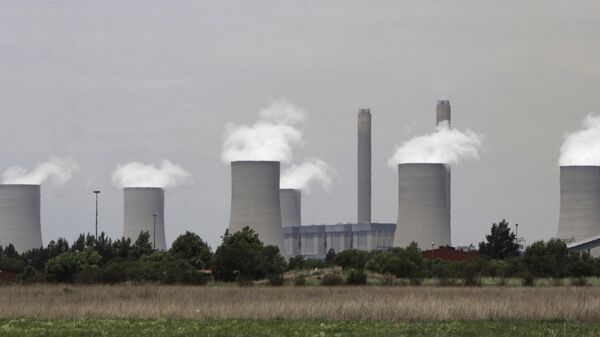 In this photo taken Monday, Nov. 21, 2011, the cooling towers at Eskom's coal-powered Lethabo power station are seen near Sasolburg, South Africa. - Sputnik Africa