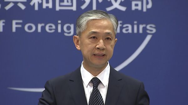 China's Foreign Ministry spokesperson Wang Wenbin speaks during the daily briefing in Beijing, June 11, 2021.  - Sputnik Africa