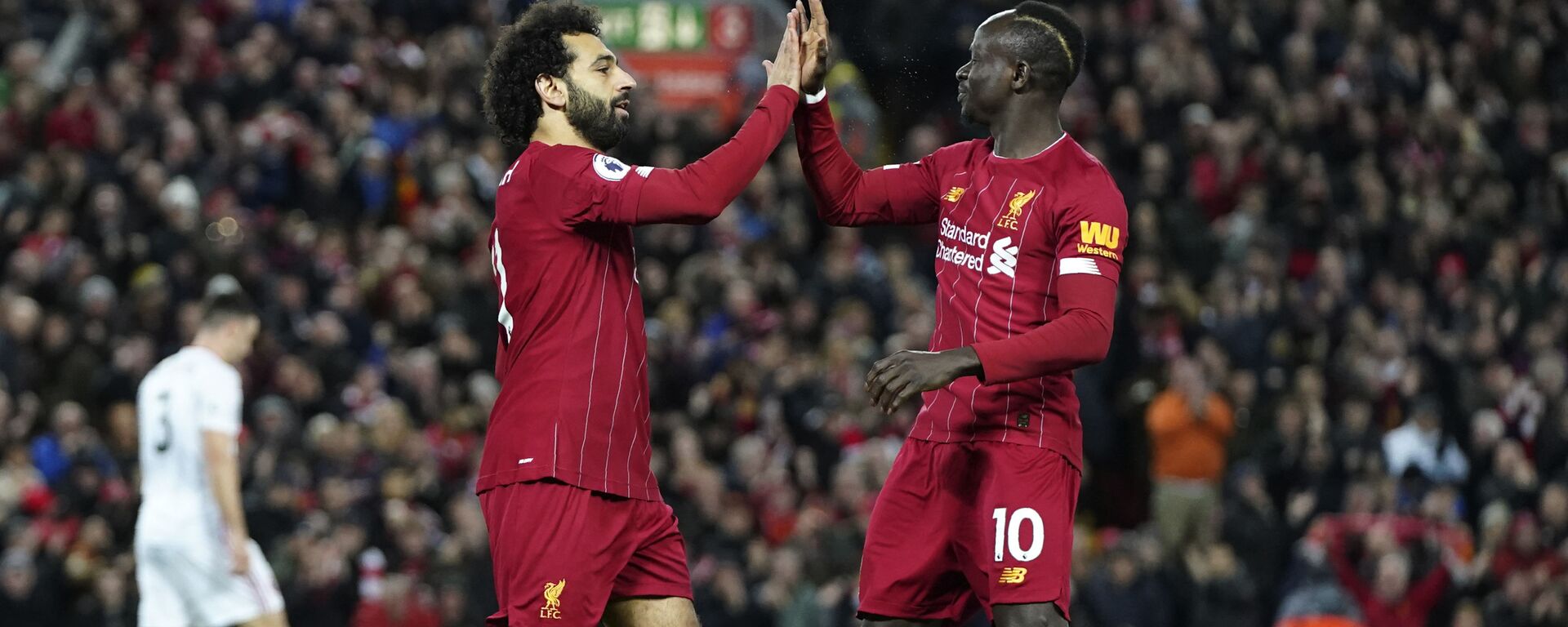 Liverpool's Mohamed Salah, front left, celebrates with Liverpool's Sadio Mane after scoring his side's opening goal during the English Premier League soccer match between Liverpool and Sheffield United at Anfield Stadium, Liverpool, England, Thursday, Jan. 2, 2020 - Sputnik Africa, 1920, 31.01.2023