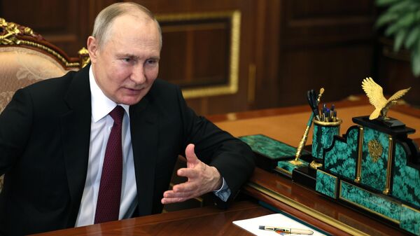Le Président russe Vladimir Poutine a rencontré iouri Borissov, PDG de Roscosmos. - Sputnik Afrique