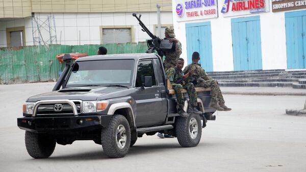 Soldiers patrol outside the Hayat Hotel in Mogadishu, Somalia, Saturday Aug, 20, 2022 - Sputnik Africa