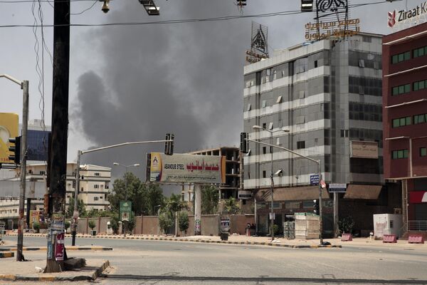Clouds of smoke are seen rising over Sudan&#x27;s capital, Saturday, April 15, 2023. - Sputnik Africa
