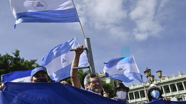 Nicaraguan citizens exiled in Guatemala demonstrate against the general elections held in Nicaragua and President Daniel Ortega's government, in Guatemala City, November 7, 2021 - Sputnik Africa