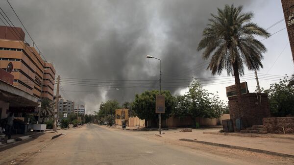 Smoke is seen rising from a neighborhood in Khartoum, Sudan, Saturday, April 15, 2023. - Sputnik Africa
