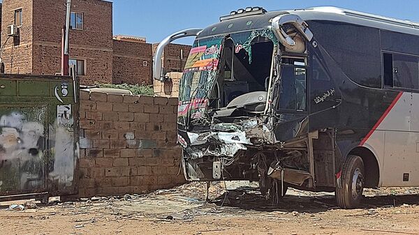Bus destroyed as a result of clashes in Hathrum, Sudan, April 18, 2023 - Sputnik Africa