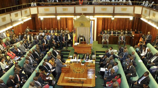 Uganda's Prime Minister, standing center-left, addresses Members of Parliament in Kampala, Uganda Thursday, Sept. 21, 2017.  - Sputnik Africa