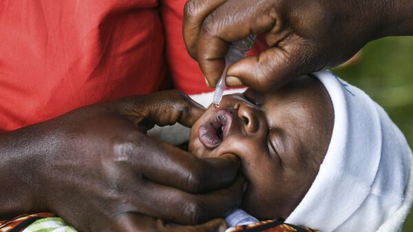 A baby receives a polio vaccine during the Malawi Polio Vaccination Campaign Launch in Lilongwe, Malawi, on March 20, 2022. - Sputnik Africa