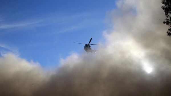 Un hélicoptère dans le ciel malien (image d'illustration) - Sputnik Afrique
