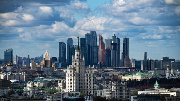 A general view shows the Soviet era skyscraper on Kotelnicheskaya Embankment of the Moskva river, Foreign ministry headquarters, Radisson Royal Hotel Moscow, the Christ the Savior cathedral and the Kremlin, with the Moscow International Business Centre, also known as Moskva-City, seen in te background, in Moscow, Russia - Sputnik Africa