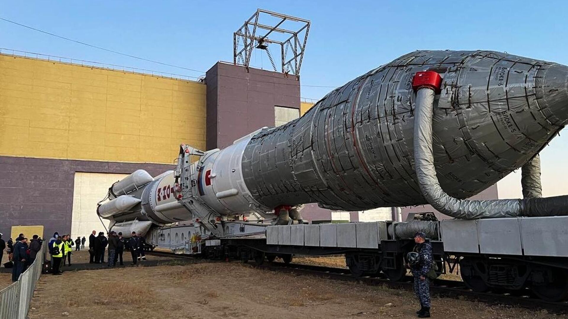 In this handout photo released by the Russian Space Agency Roscosmos, the Proton-M carrier rocket carrying the communications satellite AngoSat-2, a joint space project of Russia and Angola, is transported to a launchpad at the Baikonur Cosmodrome, Kazakhstan. Editorial use only, no archive, no commercial use. Date taken: 09.10.2022 - Sputnik Africa, 1920, 27.04.2023