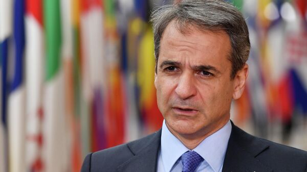 Greek Prime Minister Kyriakos Mitsotakis speaks to media prior the extraordinary meeting of EU leaders to discuss Ukraine, energy and food security at the Europa building in Brussels, Monday, May 30, 2022 - Sputnik Africa