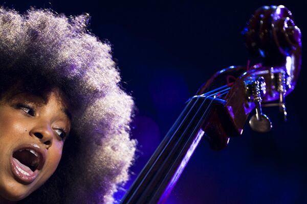 US Jazz bassist and singer Esperanza Spalding performs during a show organized by US music producer Quincy Jones at the 45th Montreux Jazz Festival in Montreux on July 13, 2011.   - Sputnik Africa