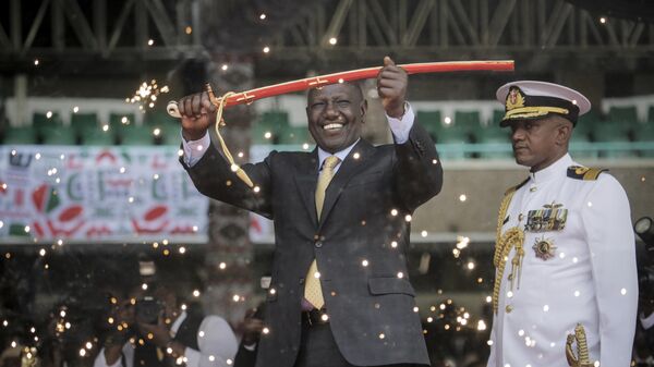 Kenya's new president William Ruto holds up a ceremonial sword as he is sworn in to office at a ceremony held at Kasarani stadium in Nairobi, Kenya Tuesday, Sept. 13, 2022.  - Sputnik Africa