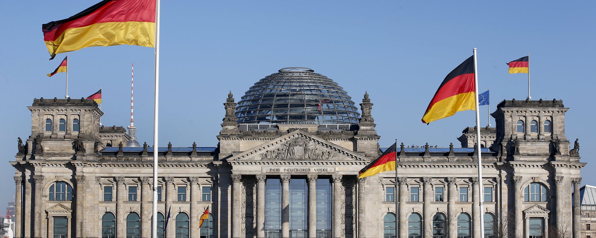 German flags wave in front of the Reichstag building, host of the German Federal Parliament Bundestag, in Berlin, Germany. (File) - Sputnik Africa, 1920, 29.04.2023