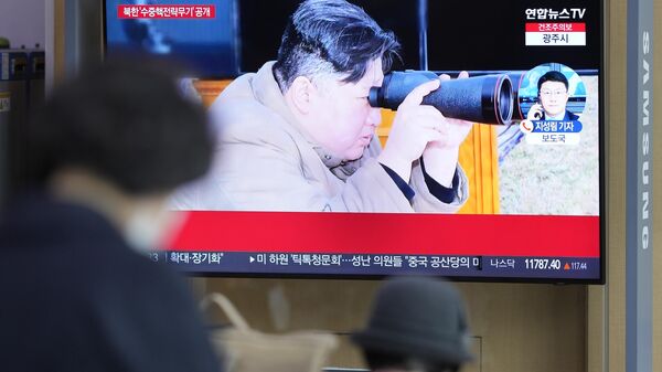 A TV screen shows an image of North Korean leader Kim Jong Un during a news program at the Seoul Railway Station in Seoul, South Korea, Friday, March 24, 2023.  - Sputnik Africa