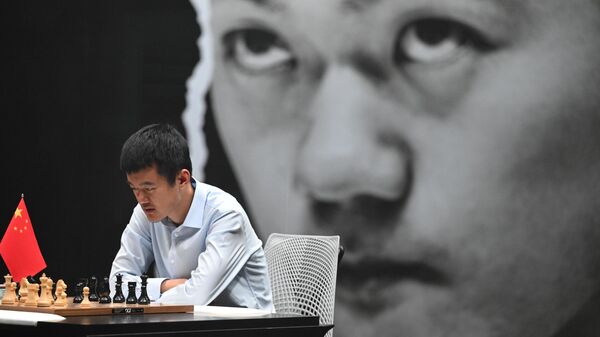 Grandmaster Ding Liren (China) plays in the tie-break game against Yang Nepomnyashchy (Russia) at the World Chess Championship in Astana. - Sputnik Africa
