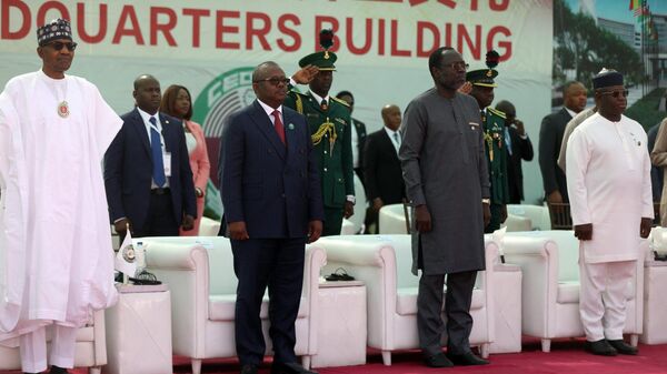 Nigeria President Muhammadu Buhari (L), Guinea Bissau and outgoing ECOWAS President, Umaro Sissoco Embalo; President (2nd L), ECOWAS incoming president Omar Touray (2nd R) and Sierra Leone Presdient, Julius Maada Bio (R), stand during the 62nd Ordinary Session of Economic Community of West African States (ECOWAS) Authority of Heads of State and Government in Abuja on December 4, 2022. - Sputnik Africa