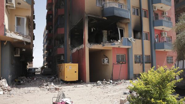 Residential buildings damaged in fighting are seen in Khartoum, Sudan, Thursday, April 20, 2023.  - Sputnik Africa