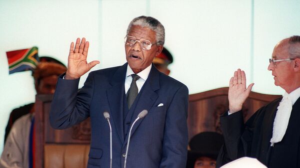 South African President Nelson Mandela takes the oath 10 May 1994 during his inauguration at the Union Building in Pretoria - Sputnik Africa