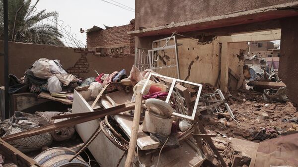 A house hit in recent fighting is seen in Khartoum, Sudan, Tuesday, April 25, 2023 - Sputnik Africa