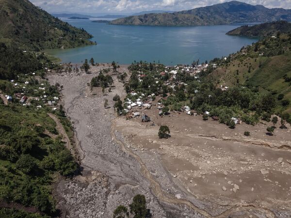 This aerial photograph taken on May 8, 2023, shows a landslide that engulfed the village of Nyamukubi, in the Democratic Republic of the Congo. The death toll from the floods and landslides triggered by heavy rain in the country’s east has risen to nearly 400, an official said on May 7, 2023. - Sputnik Africa