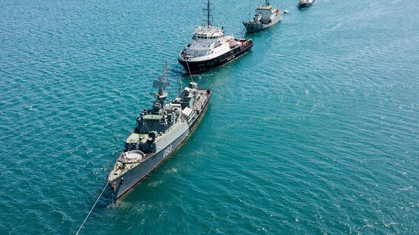 Ships of the Black Sea Fleet of the Russian Navy sail during a rehearsal of the naval parade marking the Russian Navy Day in Novorossiysk, Russia, on July 24, 2020. - Sputnik Africa
