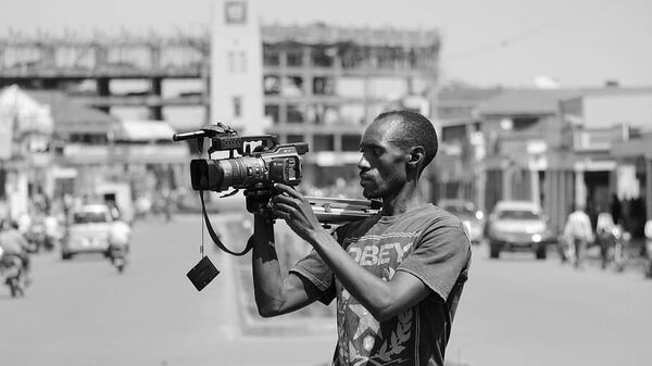 African journalist - Sputnik Africa
