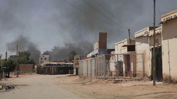 Smoke rises in Khartoum, Sudan, Wednesday, May 3, 2023.  - Sputnik Africa