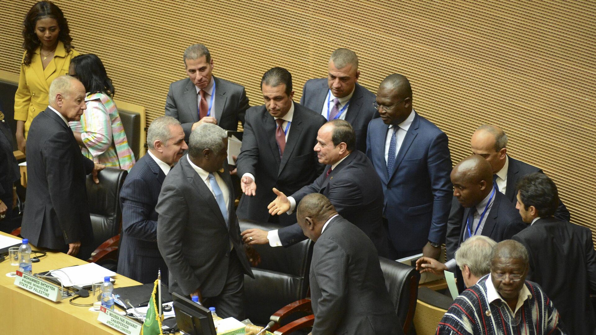 Egypt's President Abdel-Fattah el-Sissi, center, the outgoing Chairman of the African Union (AU), is greeted at opening session of the 33rd AU Summit where he was to hand over the chairmanship to South Africa's President Cyril Ramaphosa, at the AU headquarters in Addis Ababa, Ethiopia Sunday, Feb. 9, 2020.  - Sputnik Africa, 1920, 19.05.2023