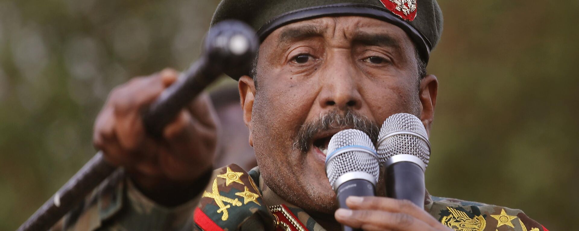 Sudanese Gen. Abdel-Fattah Burhan, head of the military council, speaks during a military-backed rally, in Omdurman district, west of Khartoum, Sudan, Saturday, June 29, 2019.  - Sputnik Africa, 1920, 19.05.2023