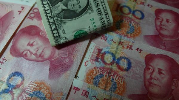 Yuan et dollars US  - Sputnik Afrique