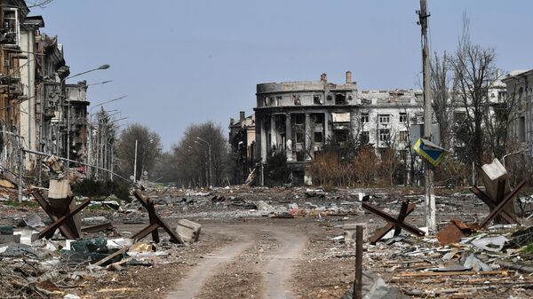 Destroyed buildings on Liberty Square, center of Artemovsk. - Sputnik Africa