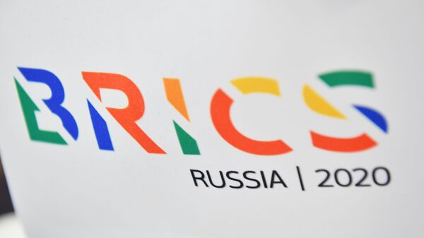 Flag with the logo of BRICS - Sputnik Africa