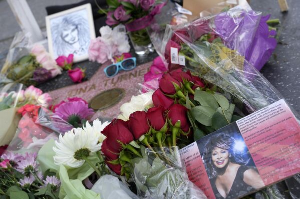 Flowers surround the late singer Tina Turner&#x27;s star on the Hollywood Walk of Fame, Wednesday, May 24, 2023, in Los Angeles. Turner died Tuesday at 83 after a long illness. - Sputnik Africa