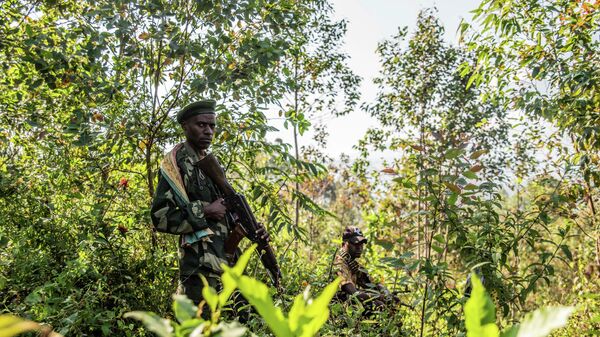 Armed militiamen gather near Rutshuru, 70 kms (45 miles) north of Goma, Democratic Republic of Congo,Wednesday June 22, 2022. - Sputnik Africa