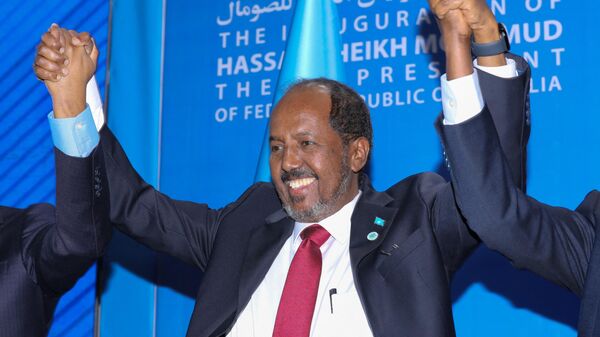 Somalia's new President Hassan Sheikh Mohamud reacts triumphantly during his inauguration as the 10th President joined by three heads of state from Kenya, Ethiopia, and Djibouti, in Mogadishu, Somalia, on June 9, 2022.  - Sputnik Africa