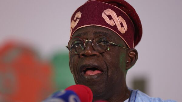 Ruling party candidate Bola Tinubu, looks on in Abuja on March 1, 2023 during celebrations at his campaign headquarters - Sputnik Africa