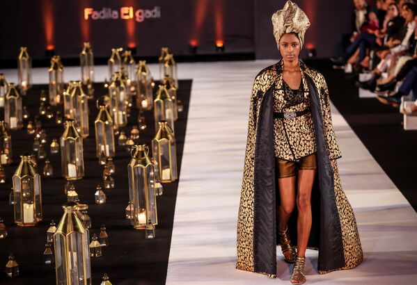 A model presents a creation by Moroccan designer Fadila El Gadi during a fashion show  in Rabat on May 30, 2023  - Sputnik Africa