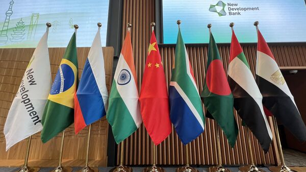 Flags are seen displayed at the opening ceremony of the New Development Bank Eighth Annual Meeting in Shanghai on May 30, 2023.  - Sputnik Afrique
