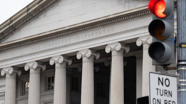 The US Treasury Department building is seen in Washington, DC, January 19, 2023, following an announcement by the US Treasury that it had begun taking measures Thursday to prevent a default on government debt, as Congress heads towards a high-stakes clash between Democrats and Republicans over raising the borrowing limit - Sputnik Africa