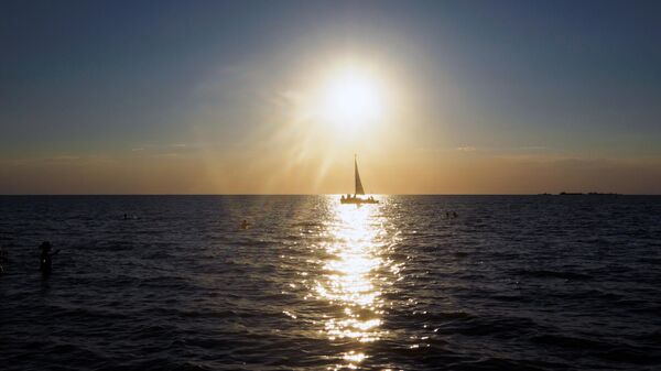 A sailboat on the Azov Sea near the resort city of Yeysk. - Sputnik Africa
