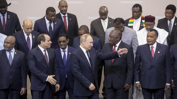 Russian President Vladimir Putin, center, gestures while posing for a photo with leaders of African countries at the Russia-Africa summit in the Black Sea resort of Sochi, Russia, Thursday, Oct. 24, 2019. - Sputnik Africa